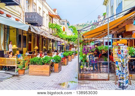 TBILISI GEORGIA - MAY 28 2016: The tourists neighborhood with fine cafes and restaurants of the local cuisine on May 28 in Tbilisi.