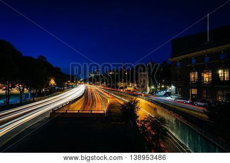 Long Exposure Of Traffic Along Storrow Drive At Night, In Beacon Hill, Boston, Massachusetts.