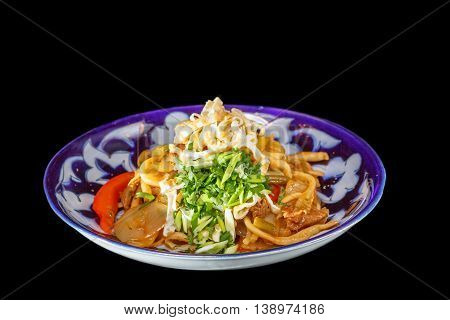 Homemade pasta with vegetables and meat. Central Asian dish.