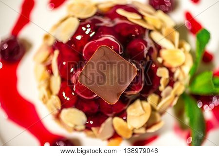 Dessert basket with berries and fruit jelly and chocolate