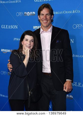 LOS ANGELES - JUL 14:  Nanci Ryder & Scott Fujita arrives to the 