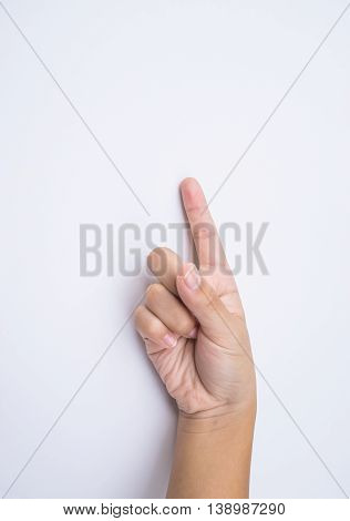 child hand shows the number three on one background