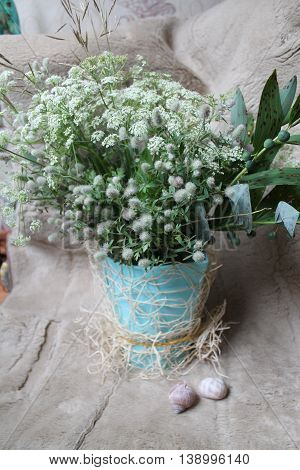 beautiful bouquet of flowers in light gray colors