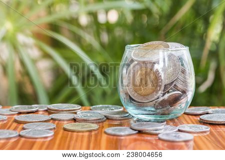 Coin In Glass Bottle With Money Stack Step Up Growing Growth Saving Money, Concept Financial Busines