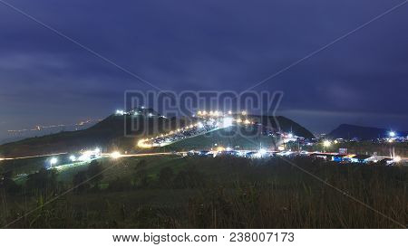 Night Shoot Long Exposure At Phu Tubberk, Thailand, Asia. Scene Have Light From Winding Road And Res
