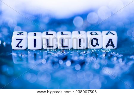 Word Zilliqa Formed By Alphabet Blocks On Mother Cryptocurrency Closeup