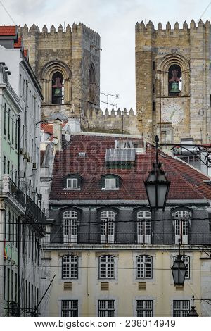 Lisbon Cathedral Over The Buildings In A Narrow Street