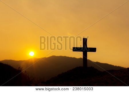 Crucifixion Of Jesus Christ., Cross Silhouette On The Mountain At Sunset