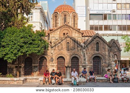 People Having A Rest In Front Of The Greek Orthodox Church Of Kapnikarea, One Of The Most Significan