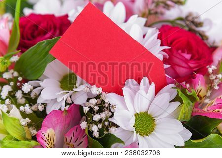 Bouquet Of Flowers With A Greeting Card. Place To Place Your Text.