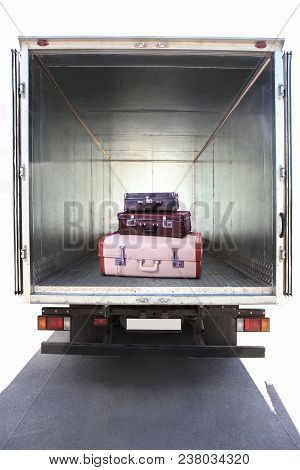 Open Metal Container Of  Truck With Suitcases Inside