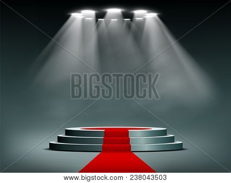 Round Podium Illuminated By Searchlights. Red Carpet. Blank Background For The Presentation. Stock V