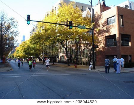 People Running The Chicago Marathon With Specators Watching, Chicago, Il October 10, 2010
