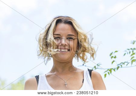 Portrait Of A Girl In A Summer Park Outdoors