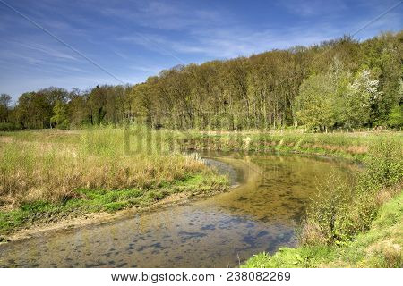 The Geleenbeek In Spring Atmosphere Flowing Through The Geleenbeek Valley Near Schinnen In The Dutch