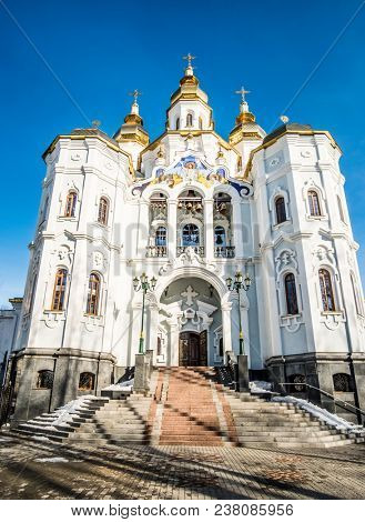 Kharkiv, Ukraine - 13 March 2018: Mironosickaya church with stairs under blue sky in Kharkiv