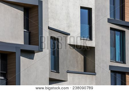 Contemporary design of multifamily living houses. Modern luxury apartments buildings