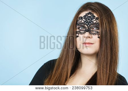 Pretty Mysterious Woman Wearing Black Eye Lace Mask Having Long Brown Hair.