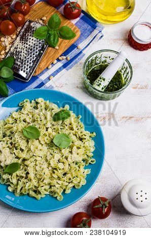 Traditional Italian Pasta With Pesto In A Plate On The Table. Selective Focus.