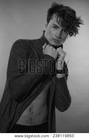 Man Portrait. Beautiful Young Guy, Naked Nude Torso With Navel, Long Forelock, Quiff. Black And Whit