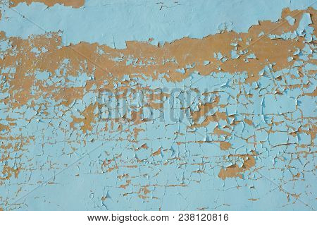 Multicolored Peeling Blue Wall Texture And Background. Surface With Scratches. Empty Template