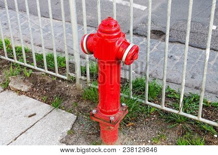 Red Old Fire Hydrant Near The Road