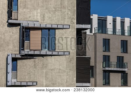 Contemporary design of multifamily living houses. Modern luxury apartments buildings