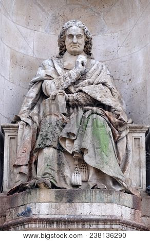 PARIS, FRANCE - JANUARY 04: The statue of Esprit Flechier by Louis Desprez, Fountain of the Sacred Orators, Place Saint-Sulpice in Paris, France on January 04, 2018.