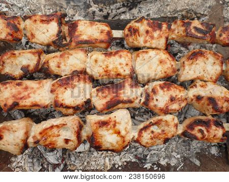 Shashlik.preparation Shish Kebab At The Stake.