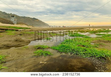 Puddles On The Beach On A Foggy Afternoon In Stinson Beach California
