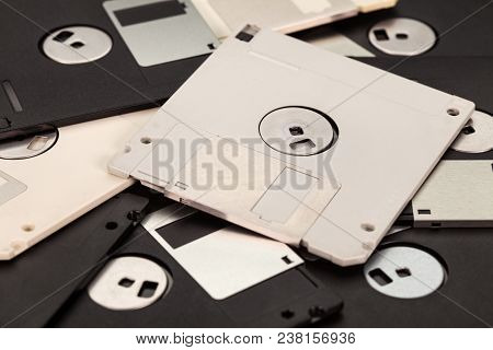 3.5 Inch Computer Floppy Disks Layer - Vintage Storage Media Technology Background