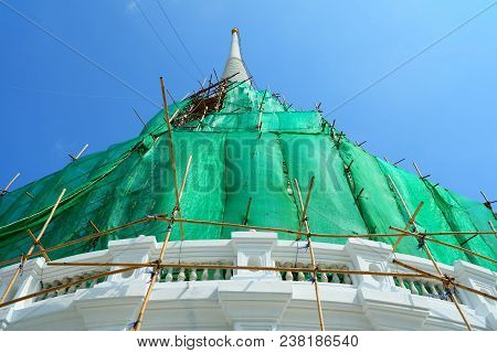 White Pagoda Under Construction At Wat Prayoon Temple, Bangkok Thailand.