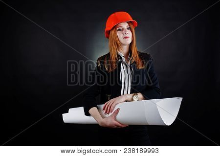 Engineer Woman In Orange Protect Helmet With Construction Paper Projekt.