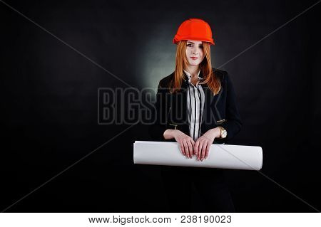 Engineer Woman In Orange Protect Helmet With Construction Paper Projekt.
