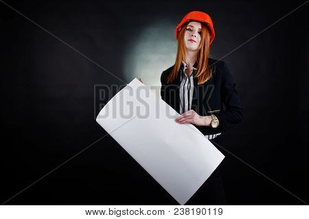 Engineer Woman In Orange Protect Helmet With Construction Paper Projekt.