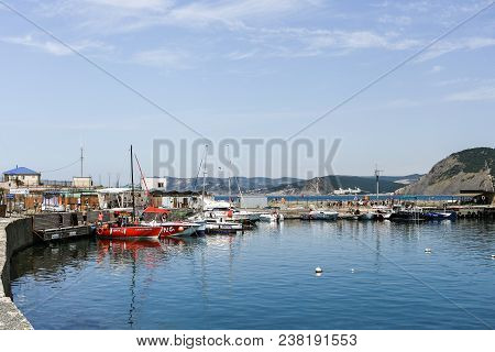 Bolshoy Utrish, Krasnodar Region, Russia -august, 16, 2017: View Of The Bay On The Island With Parki