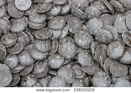 Dark Chocolate Callets Texture Background Close-up View