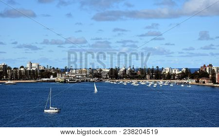 Manly Buildings Skyline From Dobroyd Head Lookout On A Sunny Day In Summer. Many Yachts In North Har