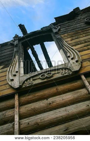 Facade Of The Burned-down Wooden House In Modernist Style