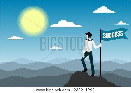 Businessman Standing On The Top Of The Mountain With Success Flag.