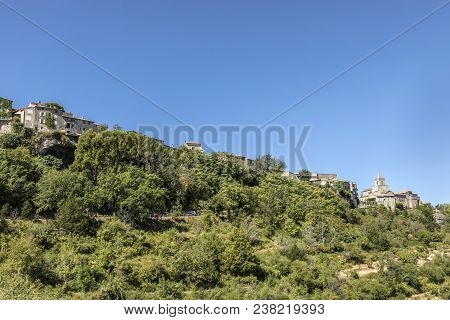 View To Old Historic Village Of Venasque In The Provence, France