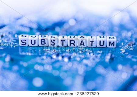 Word Substratum Formed By Alphabet Blocks On Mother Cryptocurrency Closeup