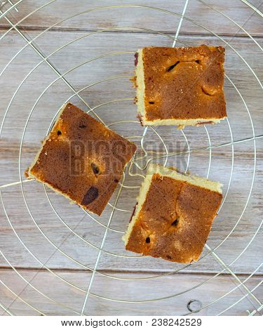 Sunken Cherry Cake On A Light Background