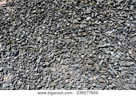 Made From Pebble Gravel Stones Different Shape As Floor Texture Background. Small Rocks Background T