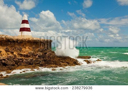 The Iconic Obelisk During The Day With Rough Seas At Robe South Australia On 10th December 2009