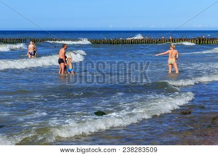 Zelenogradsk, Kaliningrad Region, Russia - July 29, 2017: Unknown People Bathing In The Baltic Sea W
