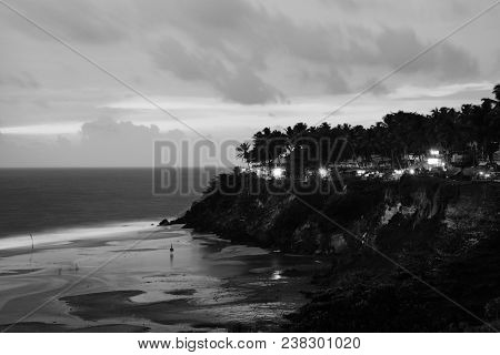 Kerala, India. Varkala Beach At Night, Various Cafes And Restaurants At The Cliff With Colorful Suns
