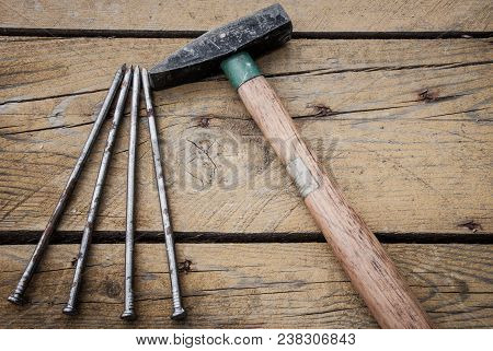 Hammer And Nails On Floorboards, Tools And Home Improvement