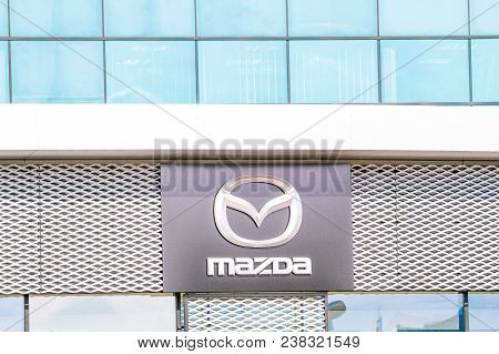 Vilnius, Lithuania - April 12, 2018: Mazda Logo On The Wall. Mazda Is A Japanese Automaker Based In 