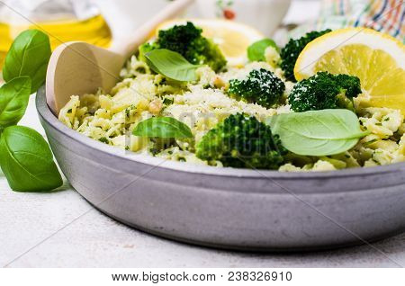 Traditional Pasta Tripoline With Pesto And Broccoli In A Plate On The Table. Selective Focus.